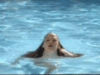Beautiful girl in swimingpool