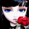 Doll with red rose