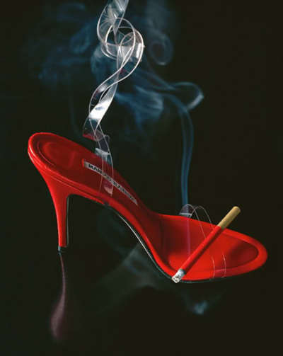 Cigarette in red shoe