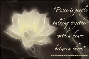 Peace is people talking together with a heart between them