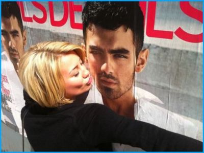 Chelsea Kane kissing Joe Jonas poster