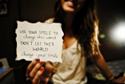 Use your smile to change this world don't let this world change your smile