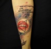 "For attractive lips, speaks words of kindness" tattoo