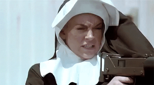 Lindsay Lohan Nun with gun 