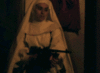 Nun with gun 