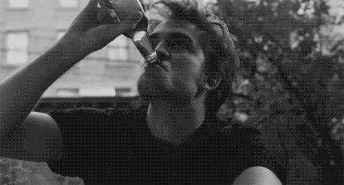 Robert Pattinson drinking