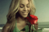 Beyonce with red flower