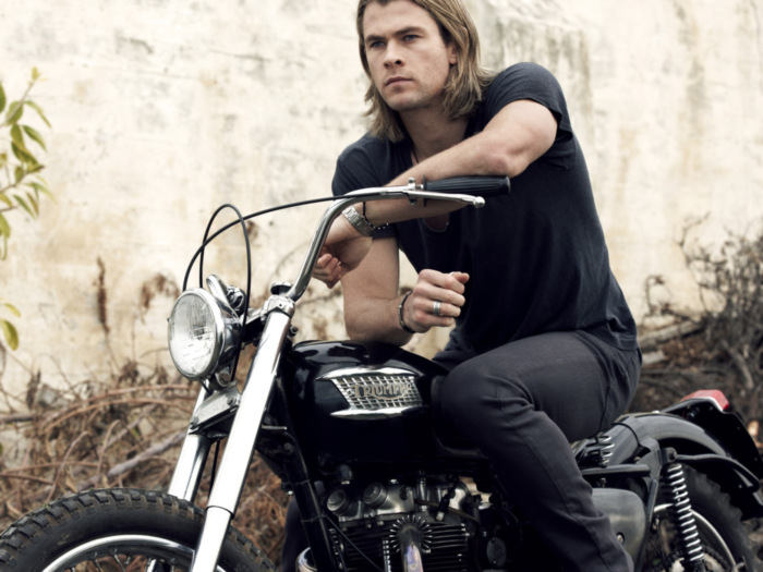 Chris Hemsworth with a bike