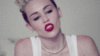 Miley Cyrus bares fangs 