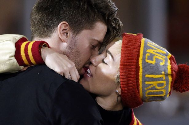 Miley Cyrus and Patrick Schwarzenegger kiss