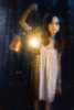 Girl with Lamp in the night