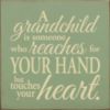 A grandchild is someone who reaches for your hand but touches your heart.