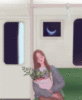 Girl with Flowers in the train