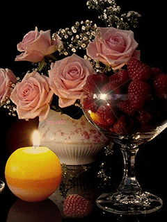 Candle, fruits and flowers
