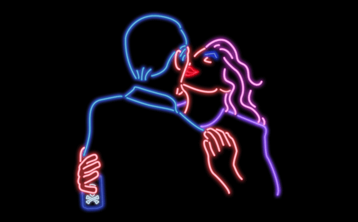 Neon couple kiss