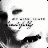 SHE WEARS DEATH BEAUTIFULLY 