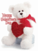 white bear with red bow and a ..