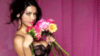 Adriana Lima sexy with flowers